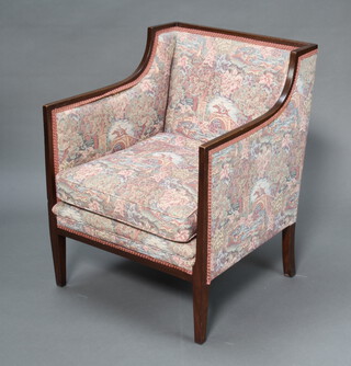 An Edwardian mahogany armchair upholstered in pink tapestry material, raised on square tapered supports 81cm h x 59cm w x 63cm d (inside measurement 48cm w x 54cm 
d) 