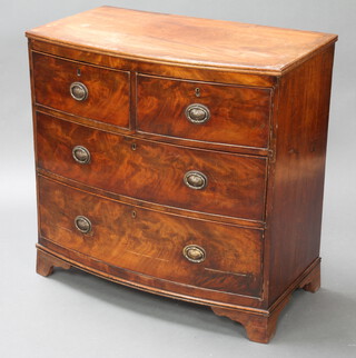 A Georgian bleached mahogany and crossbanded bow front chest of 2 short and 2 long drawers with splayed bracket feet 89cm h x 89cm w x 51cm d 