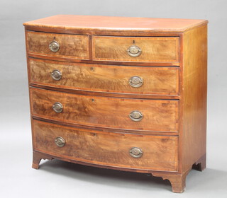 A Georgian bow front and crossbanded mahogany chest of 2 short and 3 long drawers, raised on bracket feet 99cm h x 110cm w 54cm d 