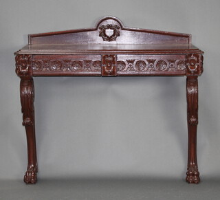 A Victorian carved "oak" console table with arch shaped raised back with shield, fitted 2 long drawers, raised on cabriole supports 100cm h x 112cm w x 40cm d 