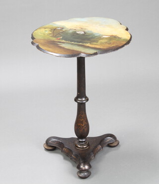 A Victorian oval papier mache snap top wine table, the top decorated a mountain scene with a figure by a bridge, raised on a turned column and triform base, raised on bun feet 71cm h x 49cm w x 57cm d 