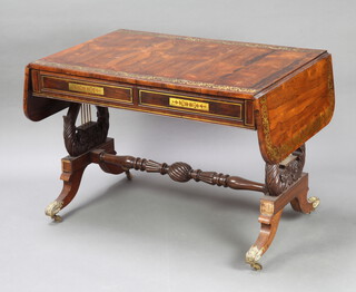 A Regency inlaid rosewood sofa table fitted 2 frieze drawers, raised on lyre supports with turned stretcher ending in brass caps and castors 73cm h x 69cm w 101cm when closed x 157cm when open 
