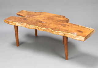 A rustic yew coffee table, the top formed from a slice of yew, raised on square tapered supports 42cm h x 125cm l x 51cm w