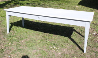 An 18th Century style white painted Continental oak kitchen table, fitted a frieze drawer and raised on square supports 75cm h x 86cm w x 231cm l