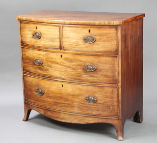 A 19th Century bleached mahogany bow front chest of 2 short and 3 long drawers raised on splayed bracket feet with replacement brass plate drop handles, 99cm h x 103cm w x 55cm d 