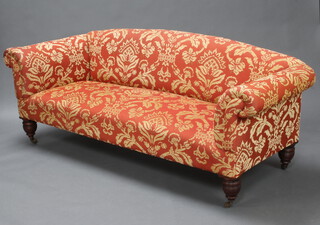 A Victorian 3 seat sofa, recently upholstered in gold and orange material raised on turned supports 204cm w x 76cm d (inside seat measurement 150cm w x 57cm d) 