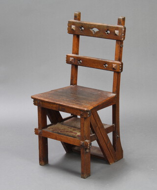 A Victorian Gothic oak metamorphic library step in the form of a ladder back chair with carved Gothic design, as a chair 88cm h x 44cm w x 35cm d, when opened to 4 tread library steps 89cm h x 34cm w x 68cm d