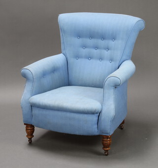 A Victorian armchair upholstered in blue buttoned material with sprung seat, raised on turned supports 92cm h x 51cm w x 58cm d (interior seat measurement 46cm w x 53cm d) 