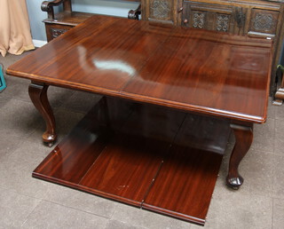 An Edwardian mahogany extending dining table with 3 extra leaves and winding handle, raised on cabriole supports 77cm h x 129cm w x 171 l x 298cm with leaves in 