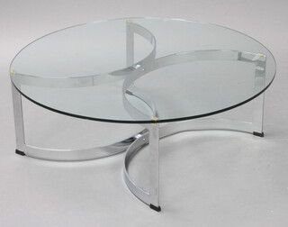 A mid Century circular chrome and plate glass coffee table, raised on chrome X shaped supports 32cm h x 91cm diam. 