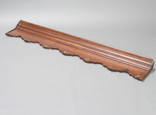 A carved oak coat rack with moulded cornice, formed from old timber, 25cm h x 165cm w x 10cm d 