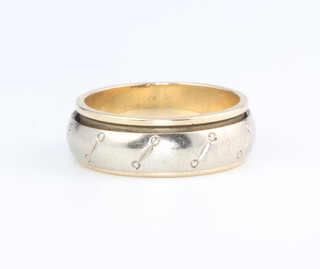 A 9ct yellow gold spinning ring, size N 1/2, 5.8 grams