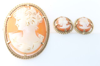 A 9ct yellow gold cameo brooch together with 2 clip on earrings 