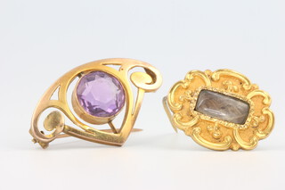 A 9ct yellow gold Art Nouveau amethyst brooch 3.2 grams, 3.25cm together with a Victorian memorial brooch 