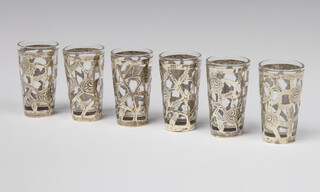 A set of 6 silver mounted glass tots, 6.5cm 