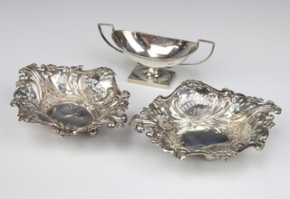 A pair of Victorian repousse silver bon bon dishes Chester 1899 and an Adam style table salt Chester 1895, 236 grams 