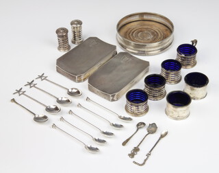 A silver coaster with pierced rim London 1928 and a quantity of silver condiments etc, weighable silver 230 grams 