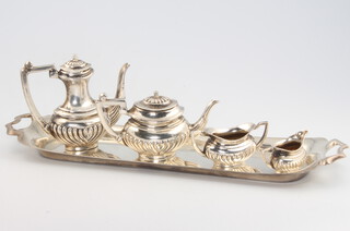 A miniature silver 4 piece demi-fluted tea set and tray Birmingham 1969 and 1970, 63 grams  