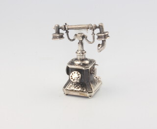 A novelty 925 standard model of a telephone 3.5cm, 15 grams