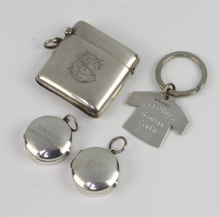 An Edwardian silver vesta Birmingham 1911, 2 silver mounted compasses and a key ring 