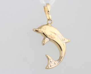 A 9ct yellow gold dolphin charm 0.8 grams