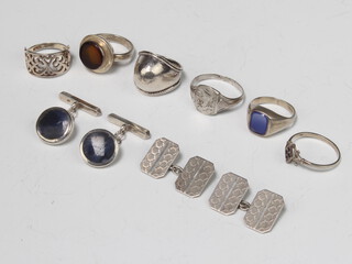 Two pairs of silver cufflinks and 6 silver dress rings, gross weight 40 grams 