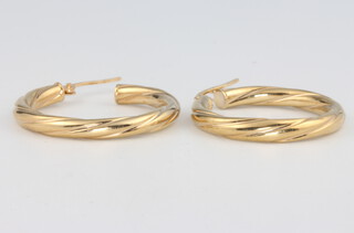 A pair of 9ct yellow gold hoop earrings, 1.3 grams