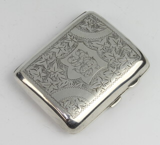 A silver card case with engraved floral decoration 97 grams, Chester 1918