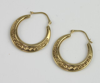 A pair of 9ct yellow gold hoop earrings 1 gram