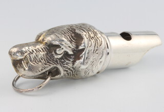 A Continental 925 silver whistle in the form of a dogs head 9.7 grams, 4cm 
