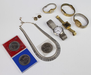 A lady's 1970's Timex wristwatch and minor watches, 3 commemorative crowns and a small collection of souvenir spoons etc 