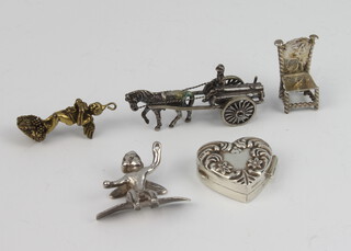 A Continental repousse silver heart shaped box and 4 miniature items 