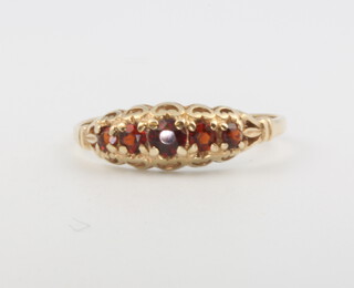 A 9ct yellow gold 5 stone garnet ring, 1.3 grams, size N 