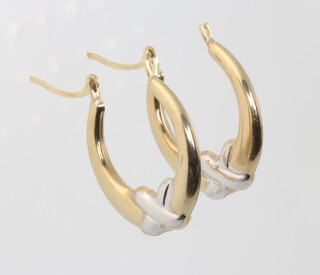 A pair of 9ct yellow gold hoop earrings 0.6 grams