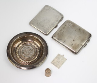 A silver cigarette case Birmingham 1913, 1 other a sterling dish, pendant and thimble, 334 grams 