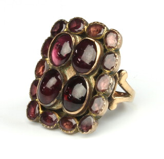 A 19th Century yellow gold cabochon cut garnet ring 9.5 grams, size P