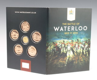 A London Mint Office Waterloo 200 presentation medallion collection including a 14ct, 7 gram proof coin
