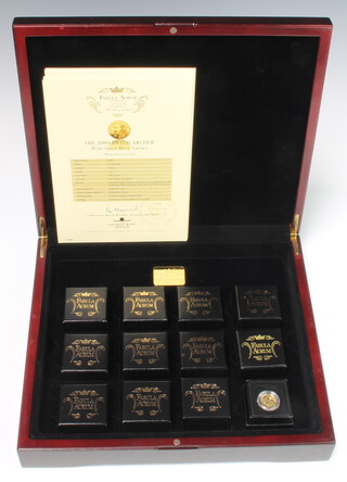 A London Mint Office Fabula Aurum Collection of 12 9ct yellow gold commemorative crowns, each 1 gram, cased and boxed 
