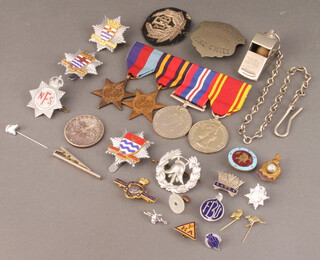 A medal group comprising 1939-45 star, Burma star, War Medal and Fire Service Long Service Medal to Sub.Offr. Sidney F Imber together with minor badges etc