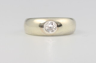 A 9ct white gold gypsy set single stone diamond ring, approx 0.25ct, 5.4 grams, size M 