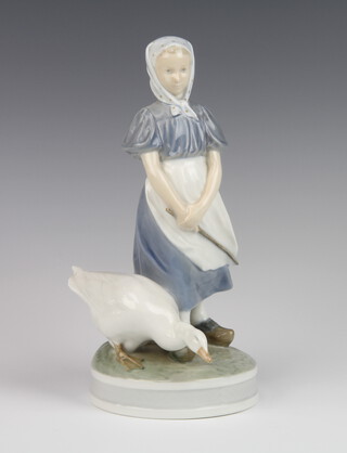 A Royal Copenhagen figure of a goose girl 527, 24cm 