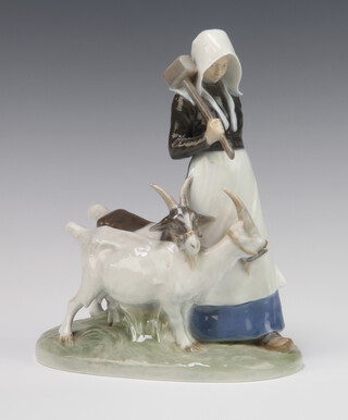 A Royal Copenhagen figure of a lady with goats 694, 23cm 