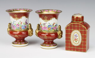 A 20th Century Dresden porcelain tea caddy and cover the ochre ground with panels of flowers 12cm, together with a pair of ditto twin handled vases decorated with flowers 13cm 