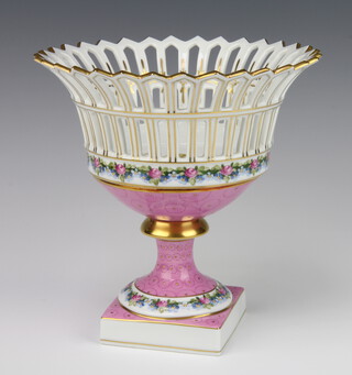 A 20th Century Dresden porcelain pierced pedestal bowl, the pink ground decorated with flowers 23cm 