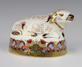 A Royal Crown Derby Imari pattern paperweight or a water buffalo with gold stopper 