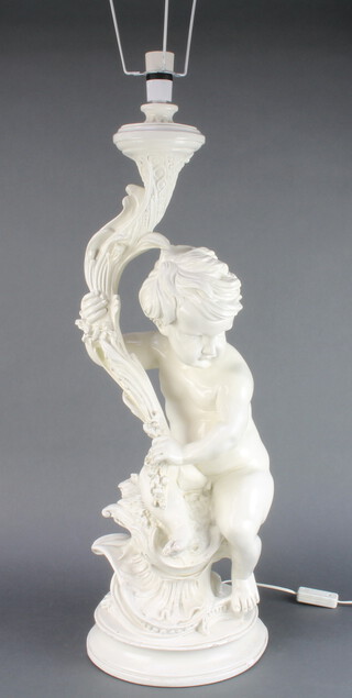 A plaster table lamp in the form of a seated cherub 69cm x 25cm 