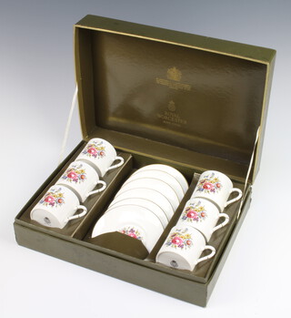 A Royal Worcester floral patterned 12 piece coffee service, boxed 