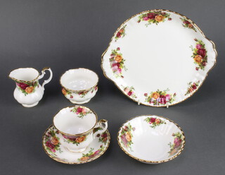 A 43 piece Royal Albert Old Country Rose pattern dinner/tea service comprising 8 dinner plates, 8 tea plates, 8 side plates, twin handled plate, 7 pudding bowls, cream jug, sugar bowl (chip to rim), 3 tea cups, 6 tea saucers 
