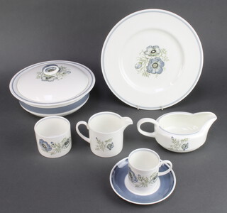 A 49 piece Susie Cooper Glen Mist dinner/coffee service comprising 2 tureens and covers, bread plate, 5 dinner plates, 6 side plates, 5 tea plates (1 with chip to rim), 6 pudding bowls, sauce boat, cream jug and stand, 6 coffee cans, 5 saucers, 4 large coffee cans and 5 saucers, sugar bowl 