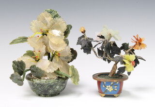 A Chinese hardstone flower group contained in a cloisonne vase 15cm together with a ditto in a hardstone vase 18cm 